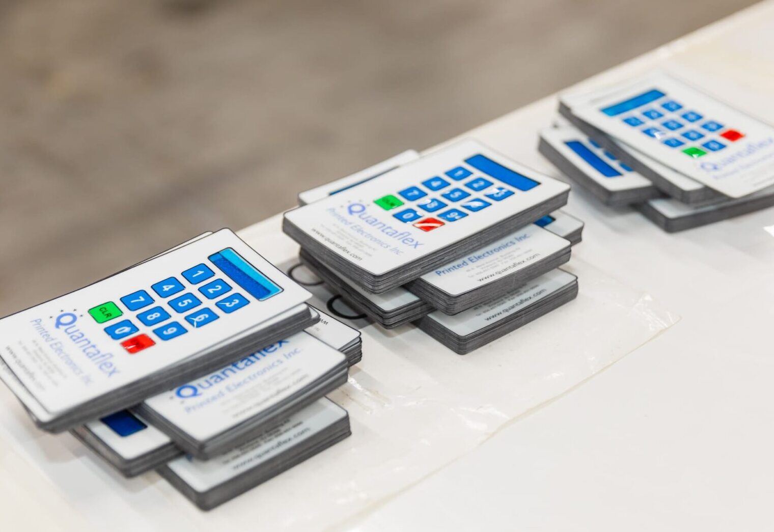 A bunch of calculators are sitting on the table